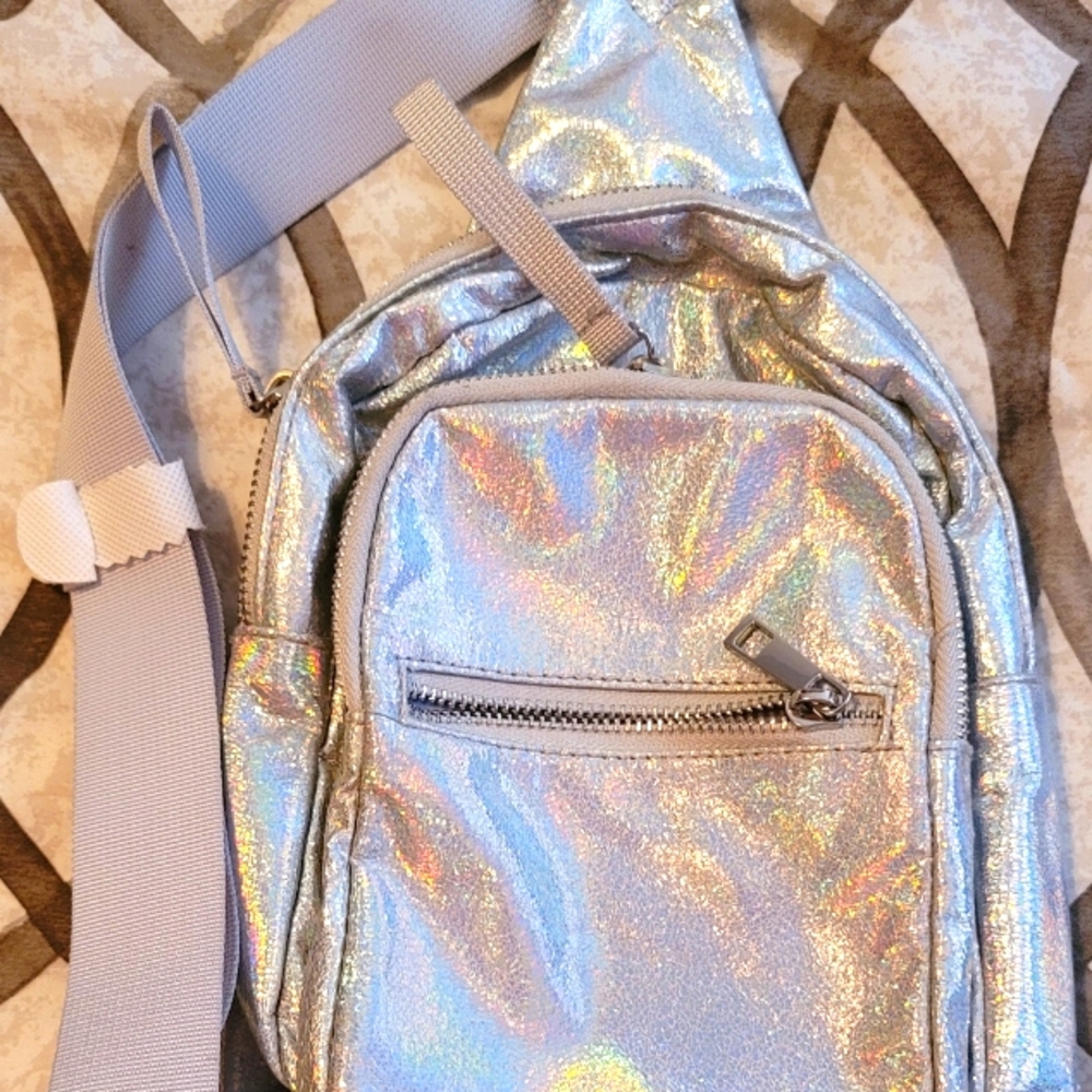 3 zip pocket, adjustable straps, mini backpack, opalescent silver